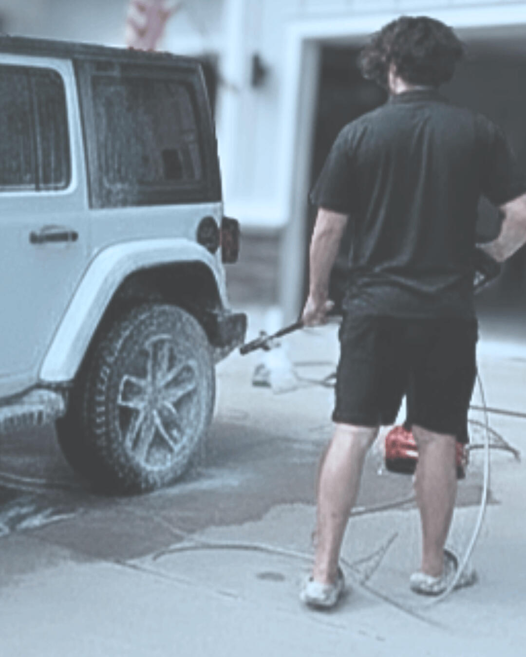 Noah Back executing a precision detailing protocol on a client vehicle for BackLab.